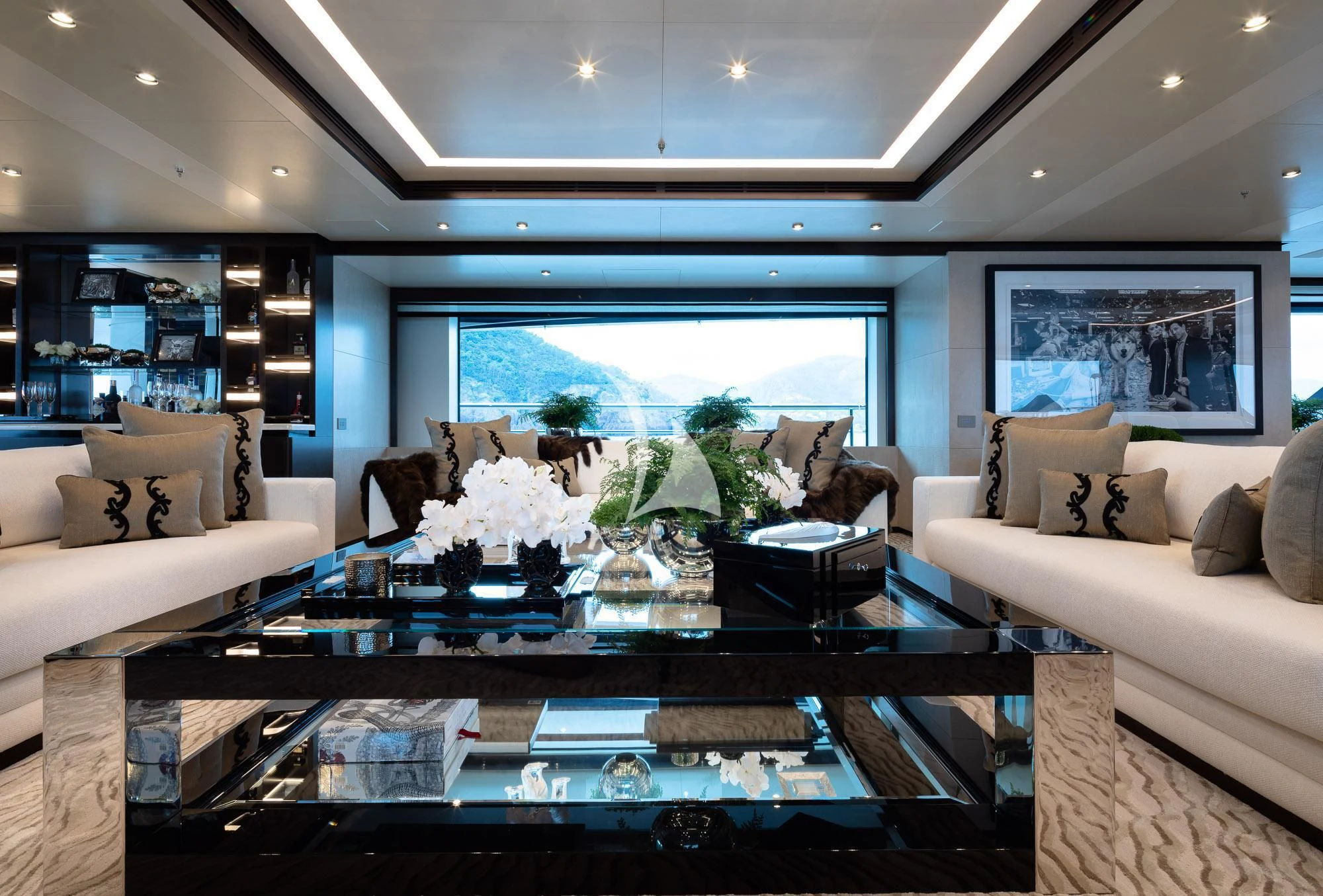 a living room with a large window aboard TRIUMPH Yacht for Sale