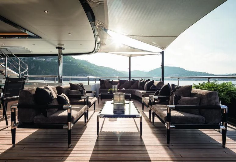 a large living room with a large patio area aboard TRIUMPH Yacht for Sale