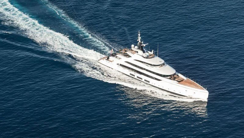 a white boat in the water aboard TRIUMPH Yacht for Sale
