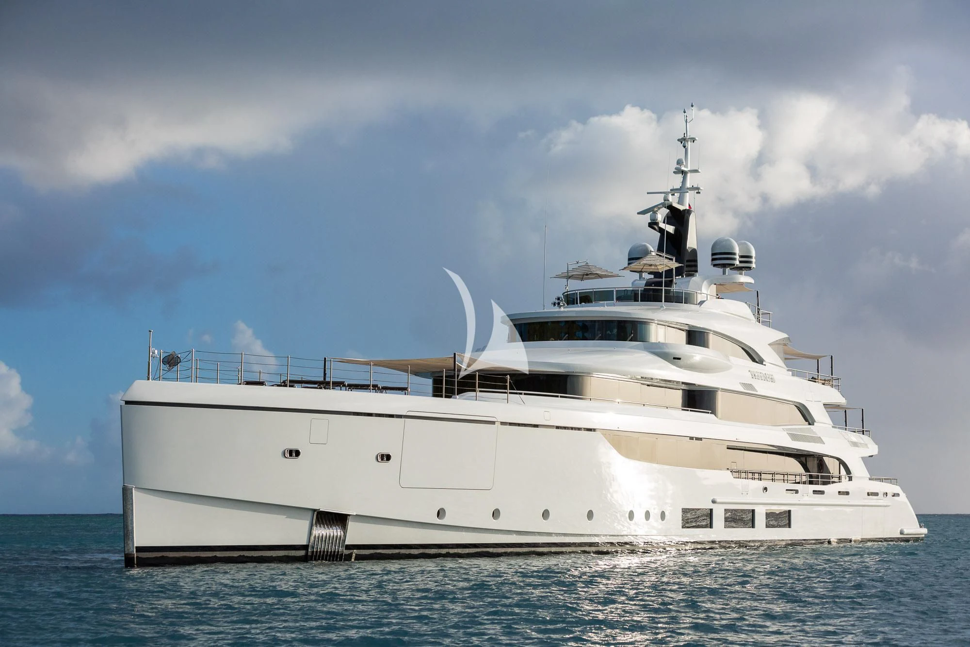 a white yacht in the water aboard TRIUMPH Yacht for Sale