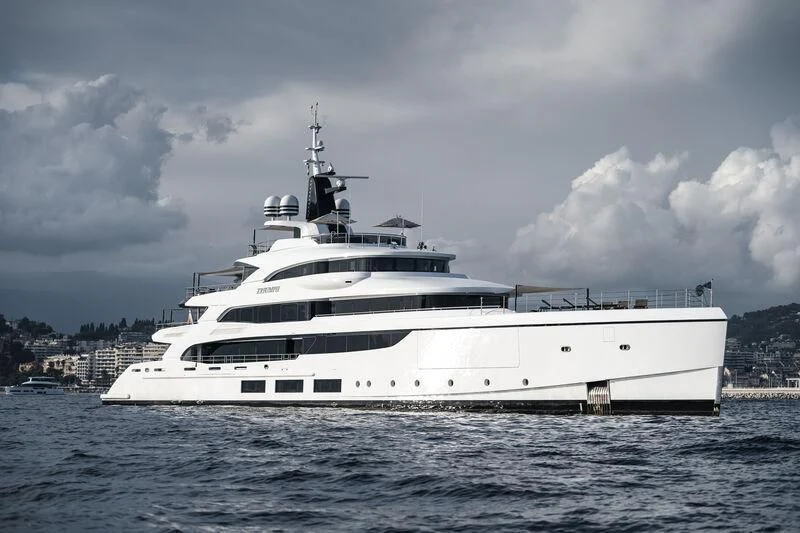 a white yacht in the water aboard TRIUMPH Yacht for Sale