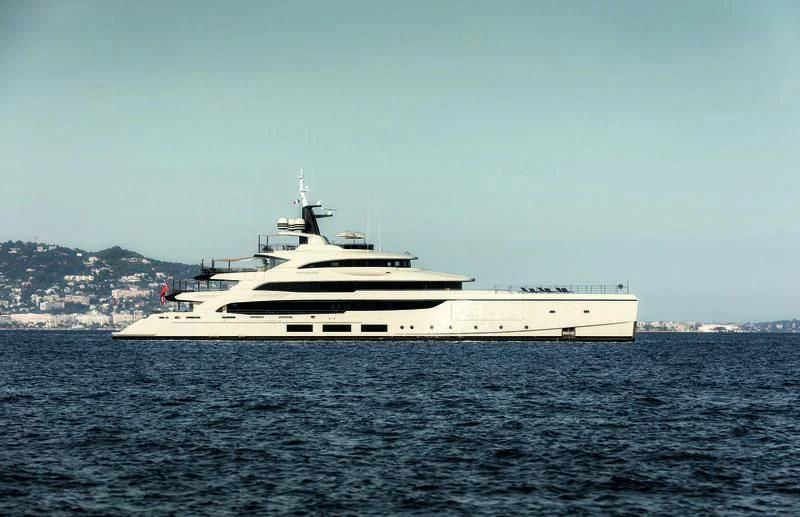 a large white boat in the water aboard TRIUMPH Yacht for Sale
