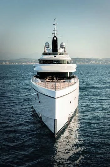a large white ship in the water aboard TRIUMPH Yacht for Sale