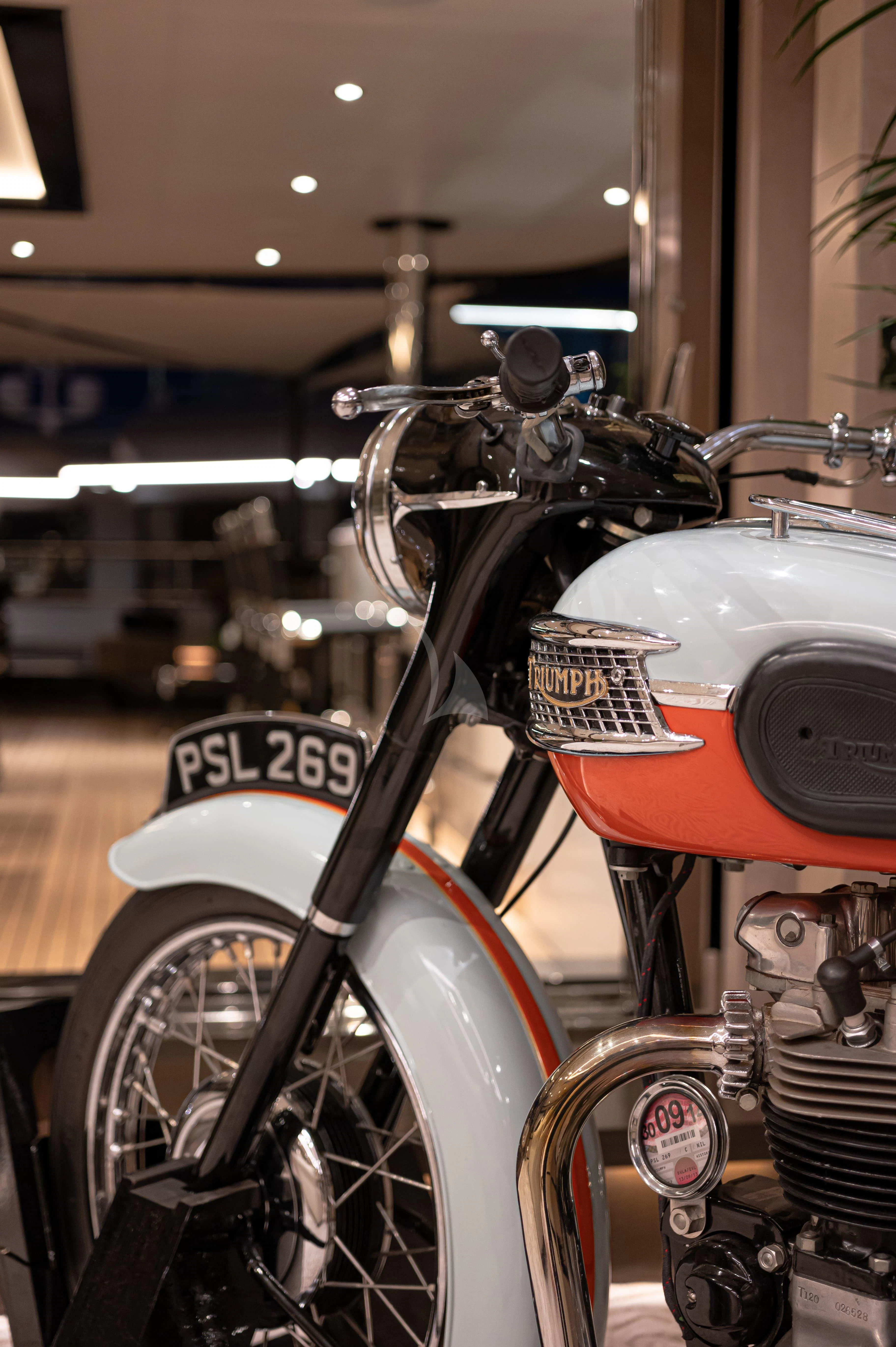 a motorcycle in a building aboard TRIUMPH Yacht for Sale