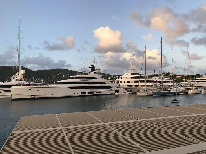a group of boats in a harbor aboard TRIUMPH Yacht for Sale
