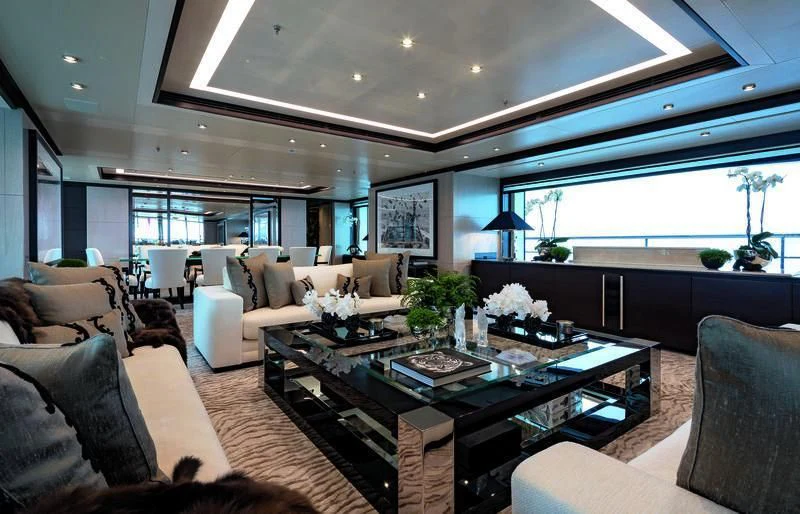 a living room with a large window aboard TRIUMPH Yacht for Sale