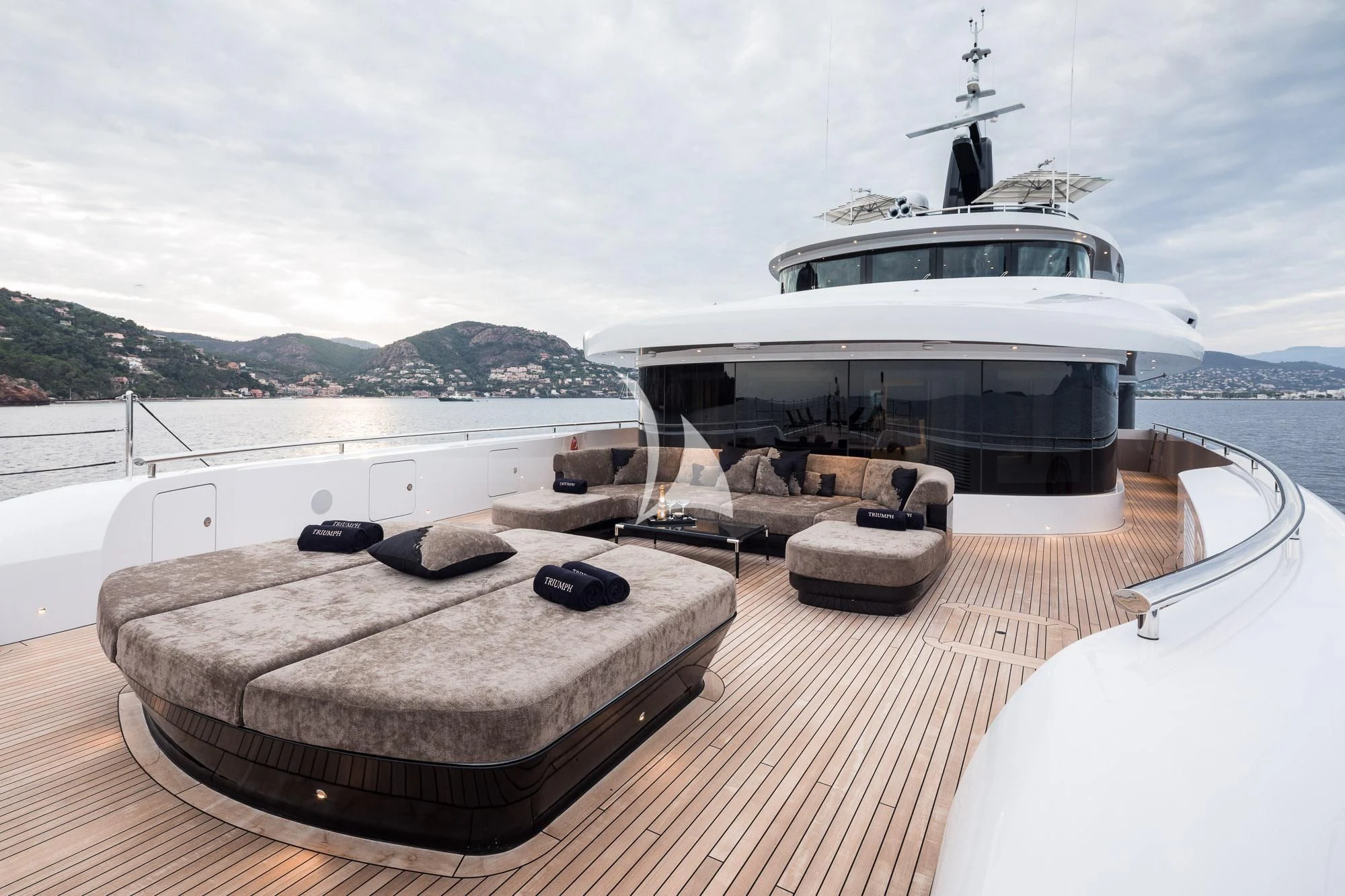 a deck with a couple of boats on it aboard TRIUMPH Yacht for Sale