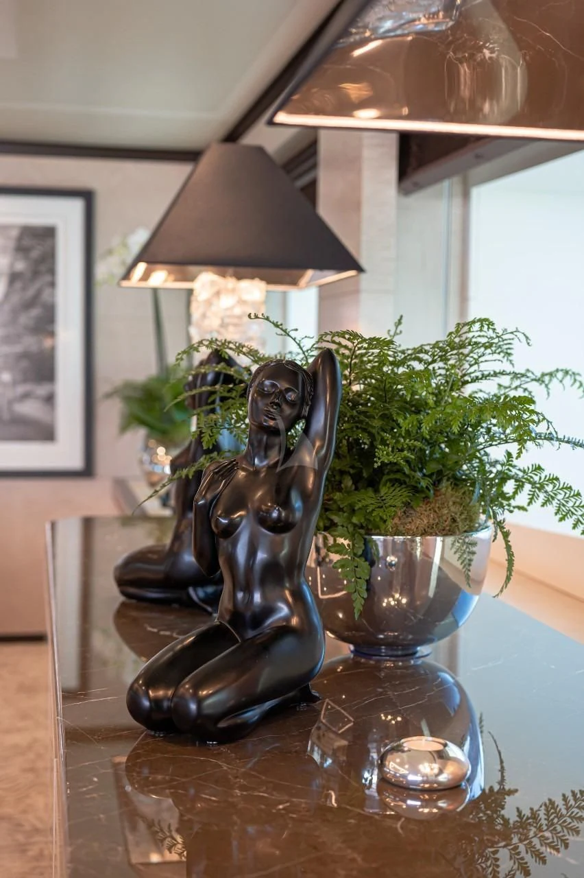 a statue of a monkey aboard TRIUMPH Yacht for Sale
