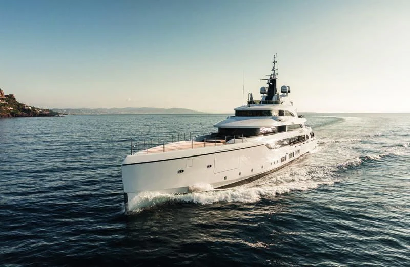 a white boat on the water aboard TRIUMPH Yacht for Sale
