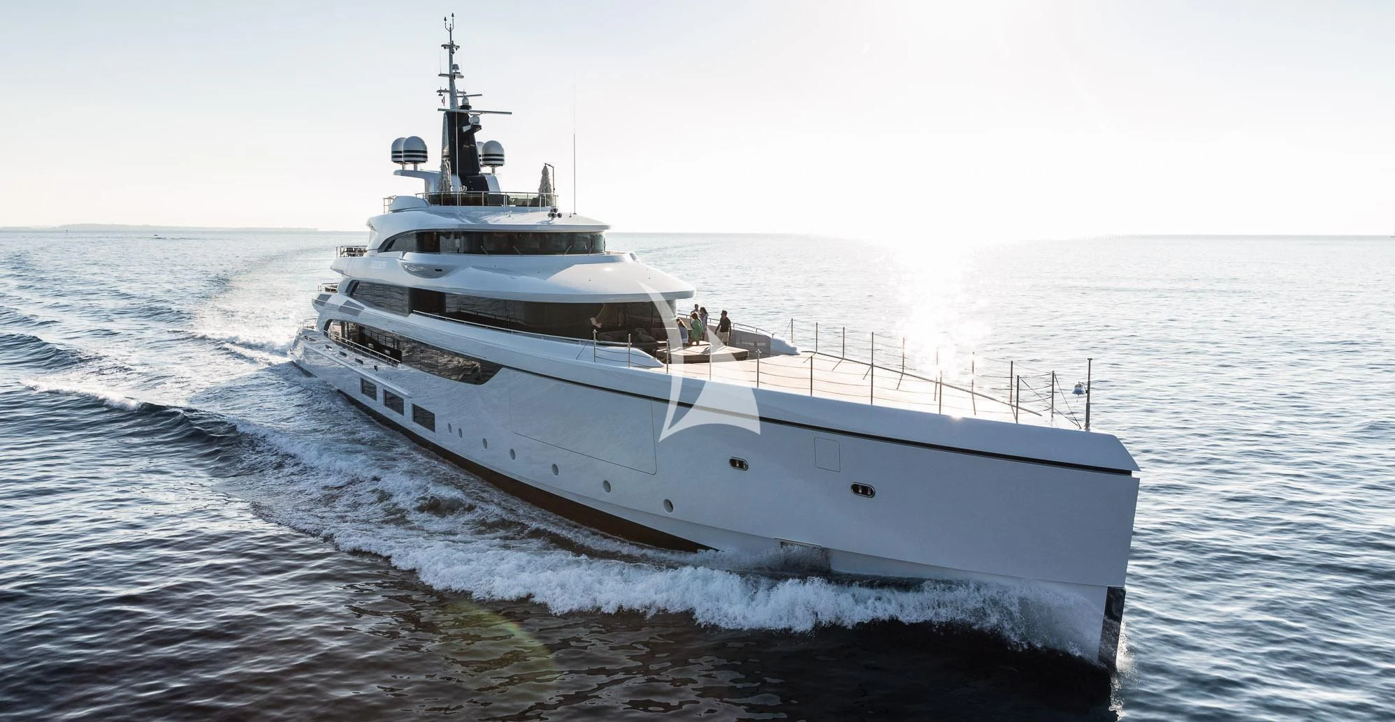 a white boat on the water aboard TRIUMPH Yacht for Sale