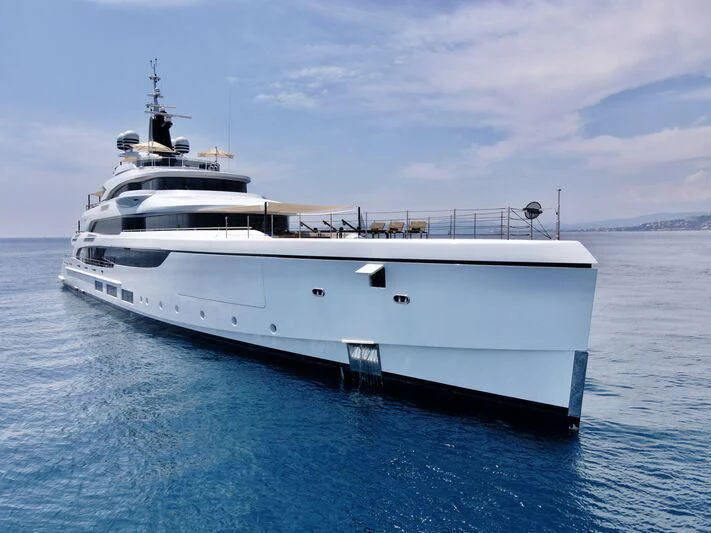 a white yacht in the water aboard TRIUMPH Yacht for Sale