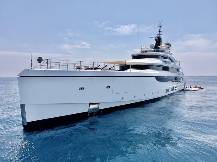 a white yacht in the water aboard TRIUMPH Yacht for Sale
