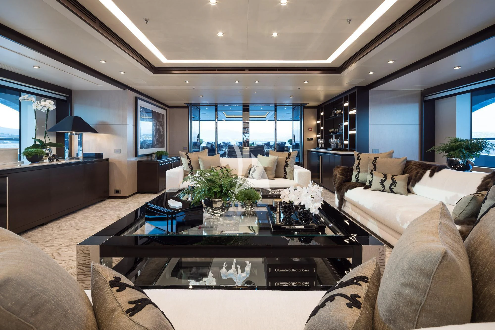 a living room with a large window aboard TRIUMPH Yacht for Sale