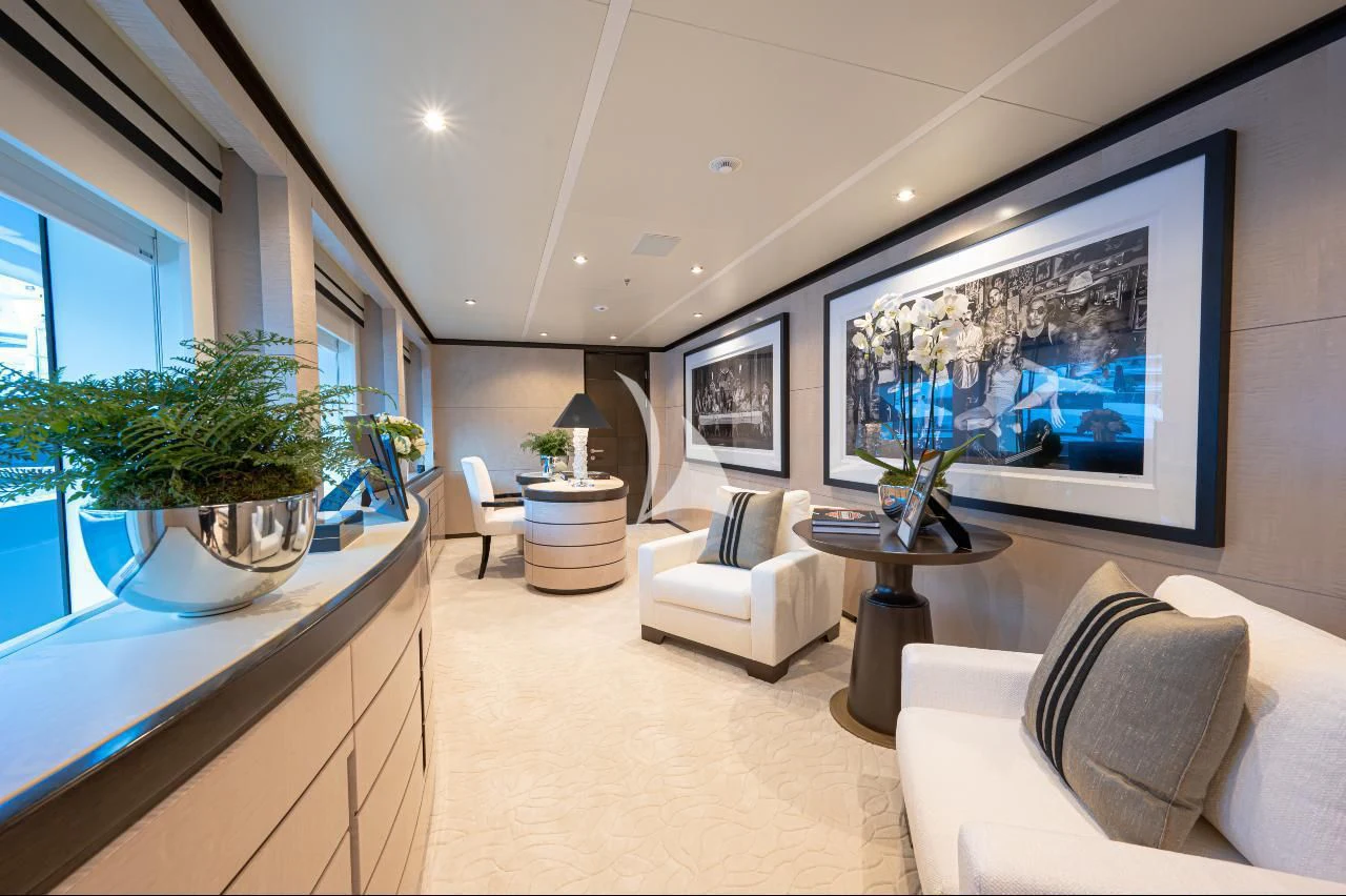 a living room with a large window aboard TRIUMPH Yacht for Sale