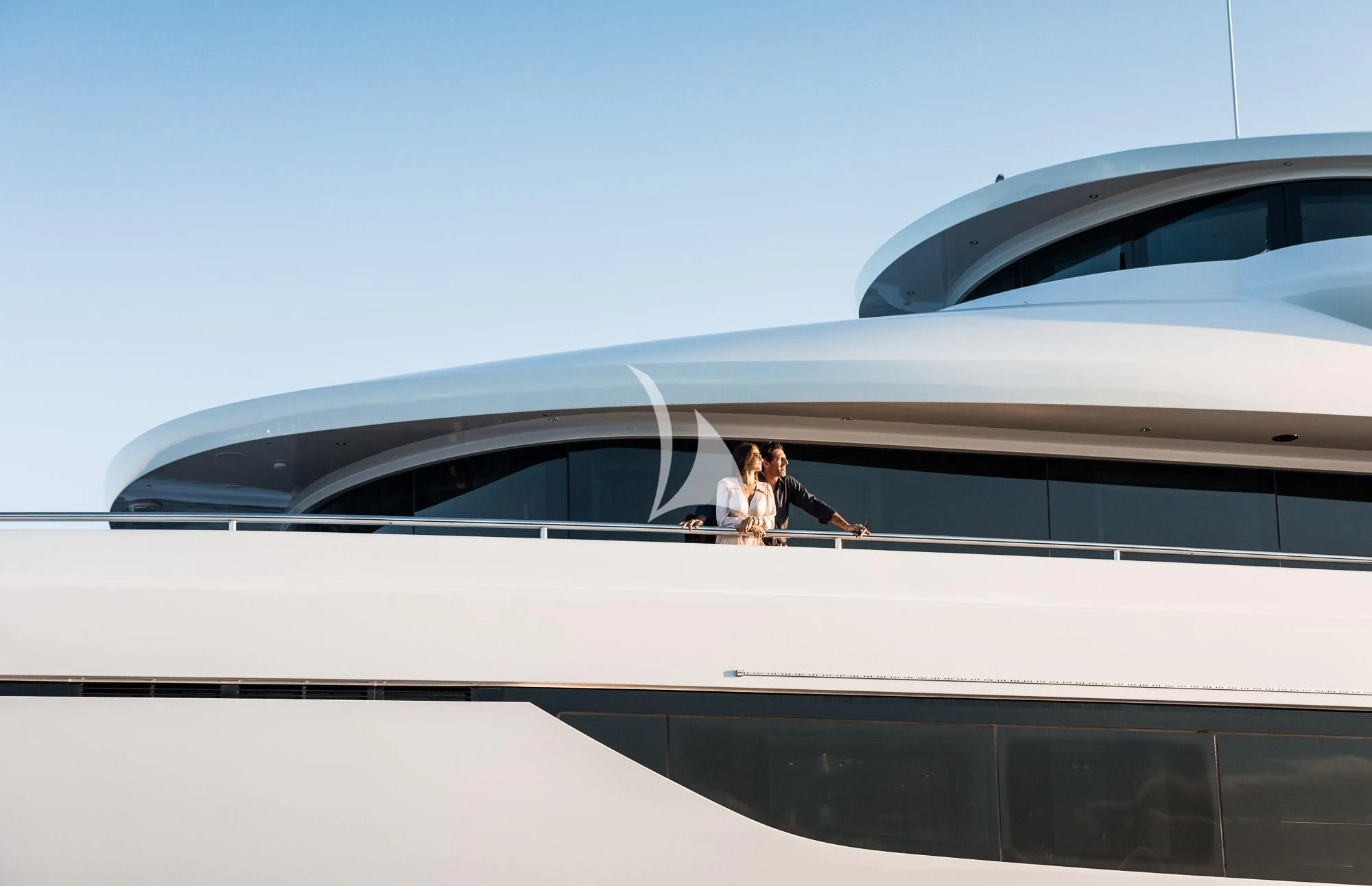 a man and woman sitting on a plane aboard TRIUMPH Yacht for Sale