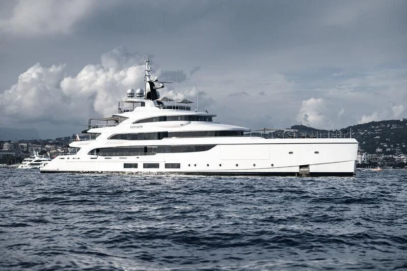 a large white ship in the water aboard TRIUMPH Yacht for Sale