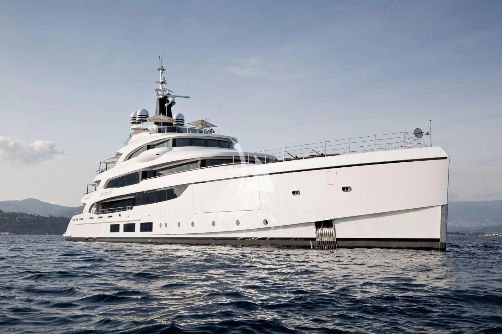 a white yacht in the water aboard TRIUMPH Yacht for Sale