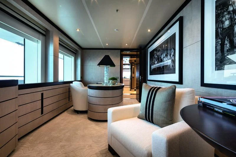 a living room with a large window aboard TRIUMPH Yacht for Sale