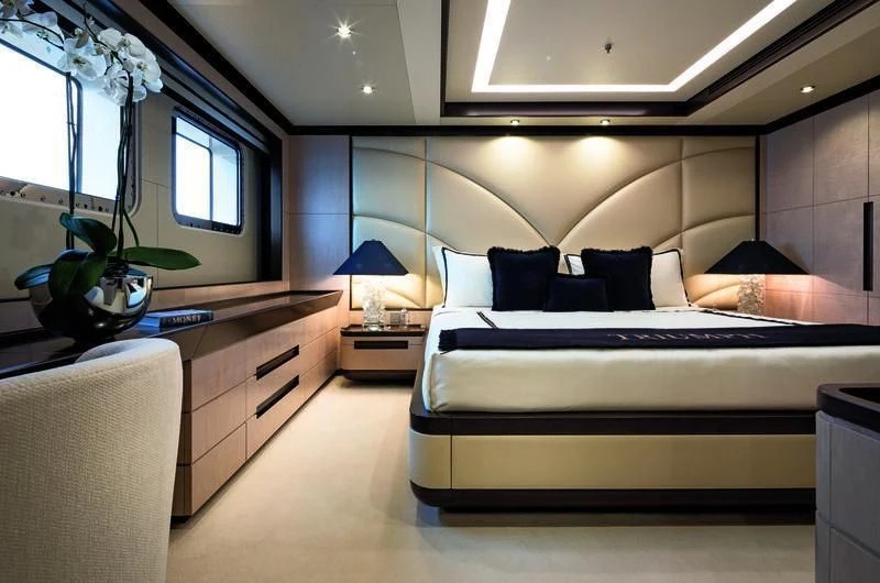 a bed in a room aboard TRIUMPH Yacht for Sale