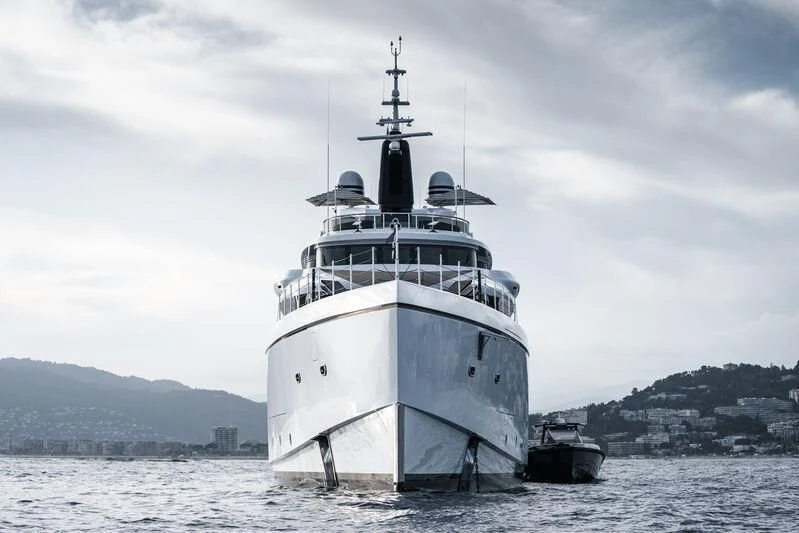 a large ship in the water aboard TRIUMPH Yacht for Sale