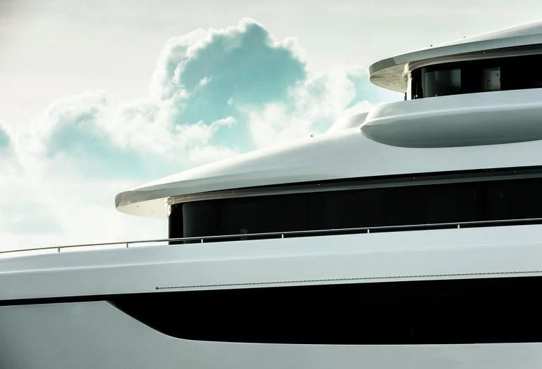 a plane wing with clouds in the background aboard TRIUMPH Yacht for Sale