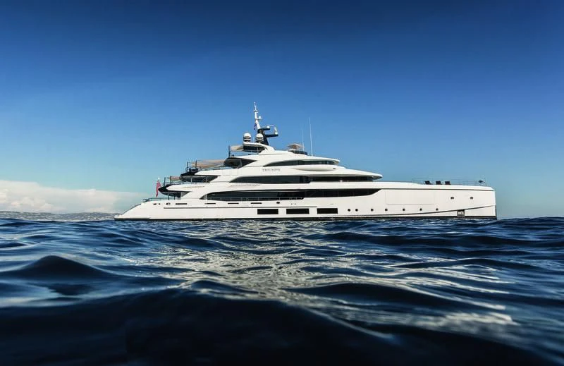 a white yacht in the water aboard TRIUMPH Yacht for Sale