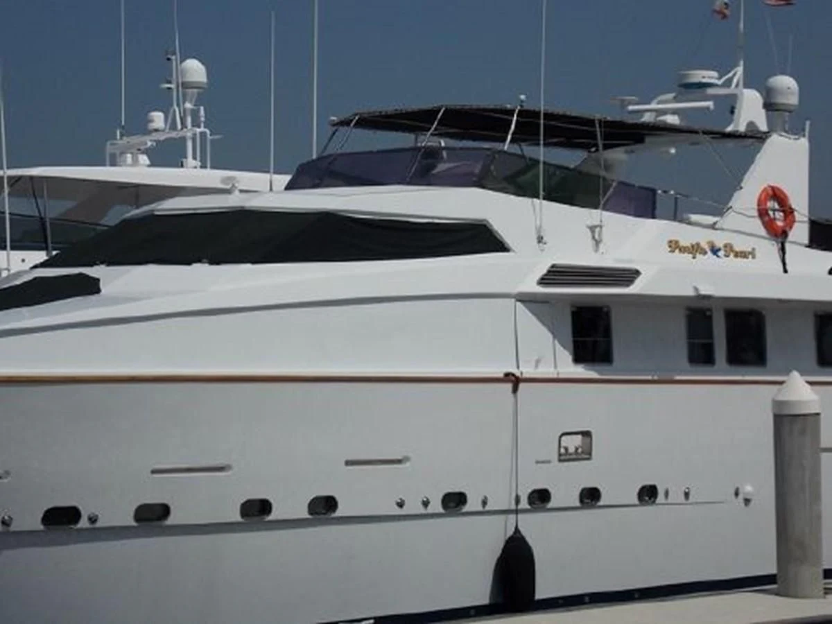 a white yacht with a red propeller aboard SILVER SPIRIT II Yacht for Sale
