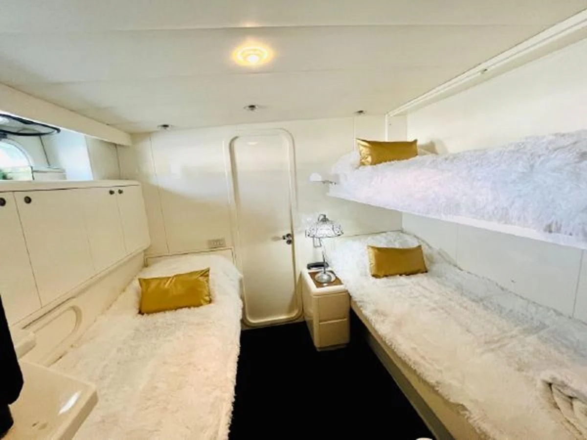 a room with two beds aboard SILVER SPIRIT II Yacht for Sale