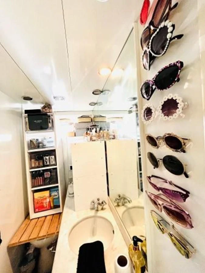 a bathroom with a sink and a mirror aboard SILVER SPIRIT II Yacht for Sale