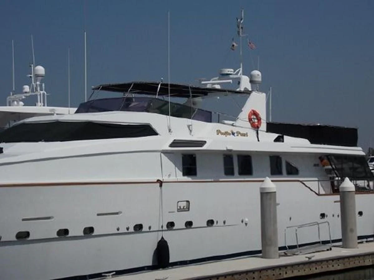 a white yacht docked aboard SILVER SPIRIT II Yacht for Sale