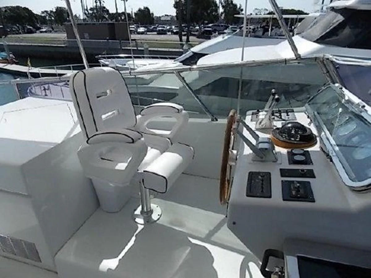 a white car with a door open aboard SILVER SPIRIT II Yacht for Sale