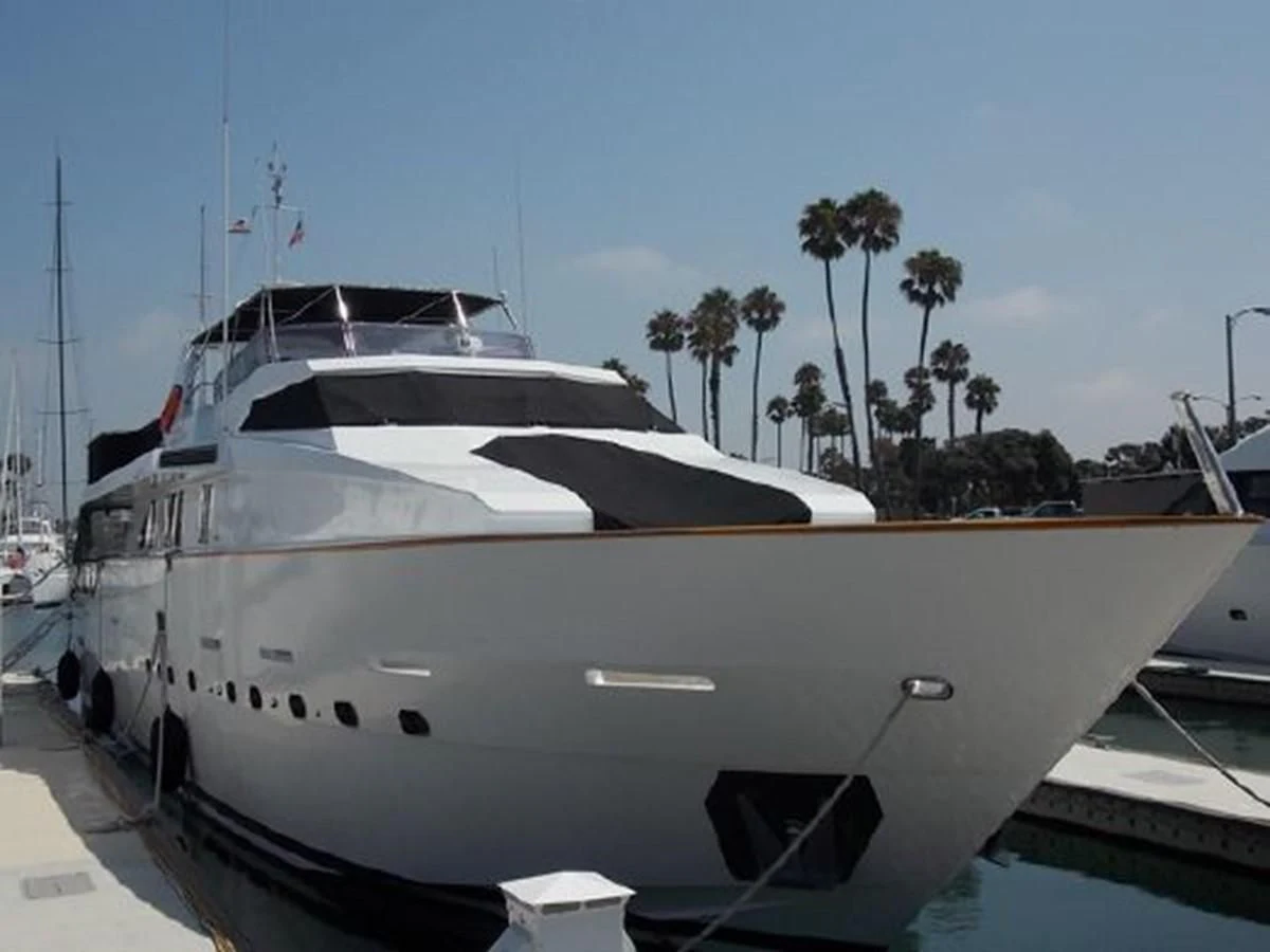 a white yacht parked at a dock aboard SILVER SPIRIT II Yacht for Sale