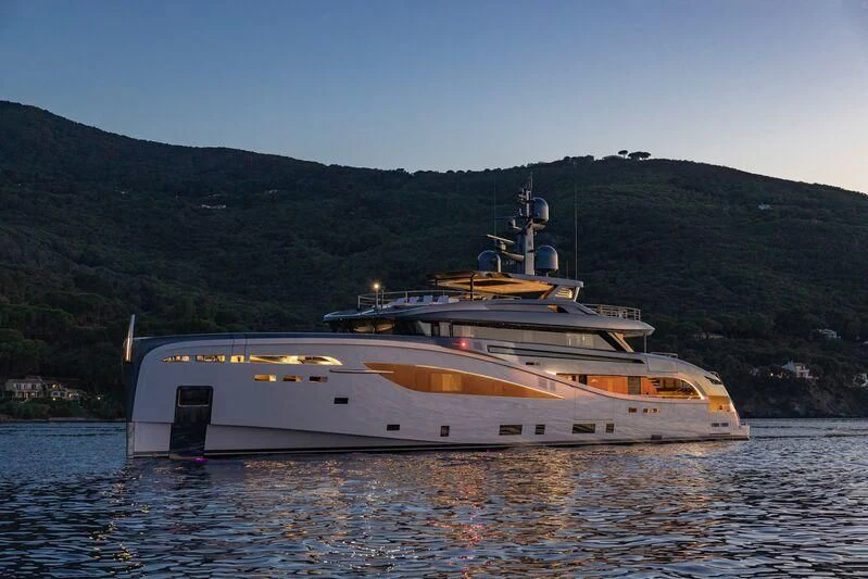 a large ship in the water aboard BEL 1 Yacht for Sale