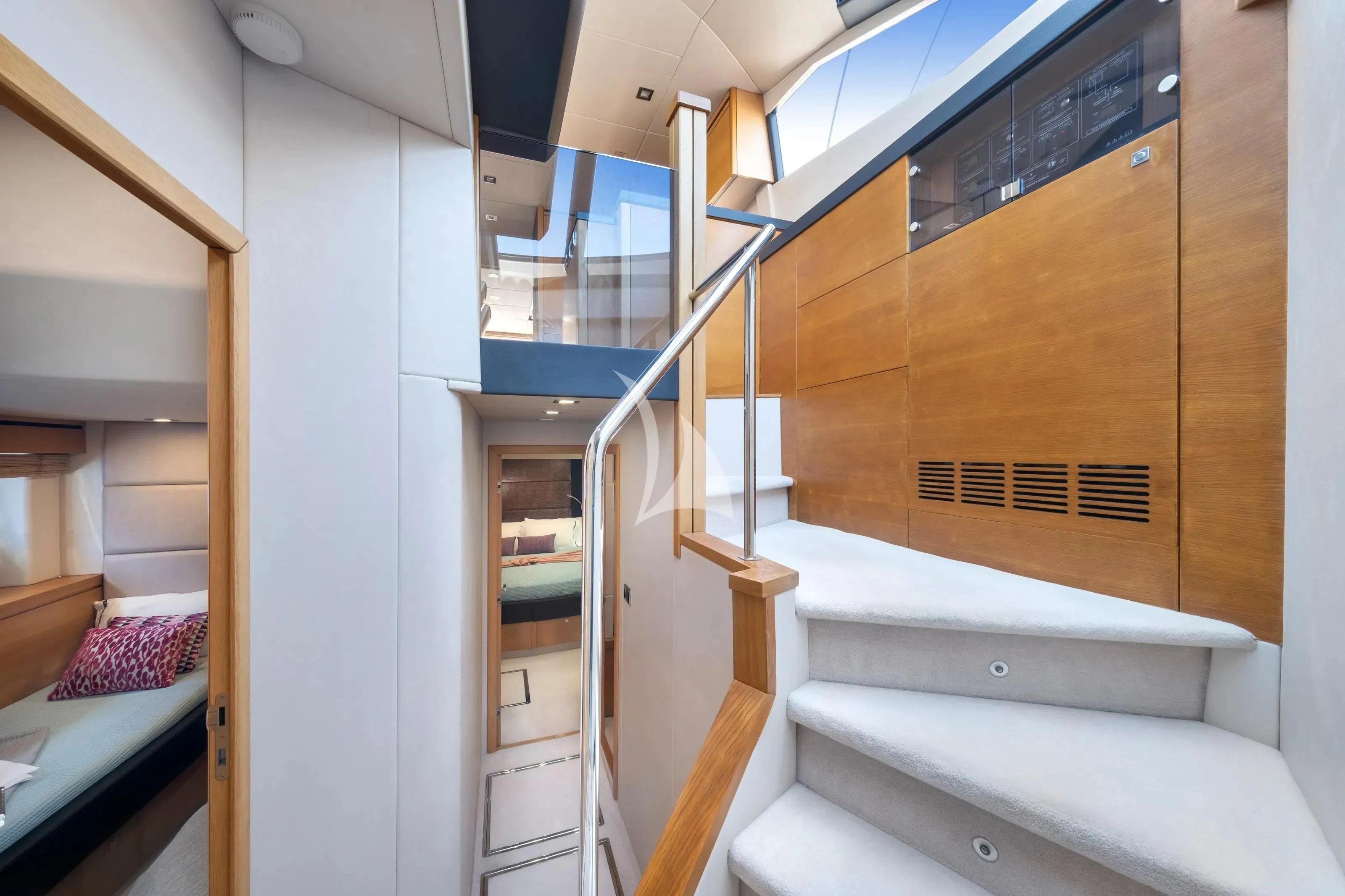 a room with a bed and a staircase aboard POLPO Yacht for Charter