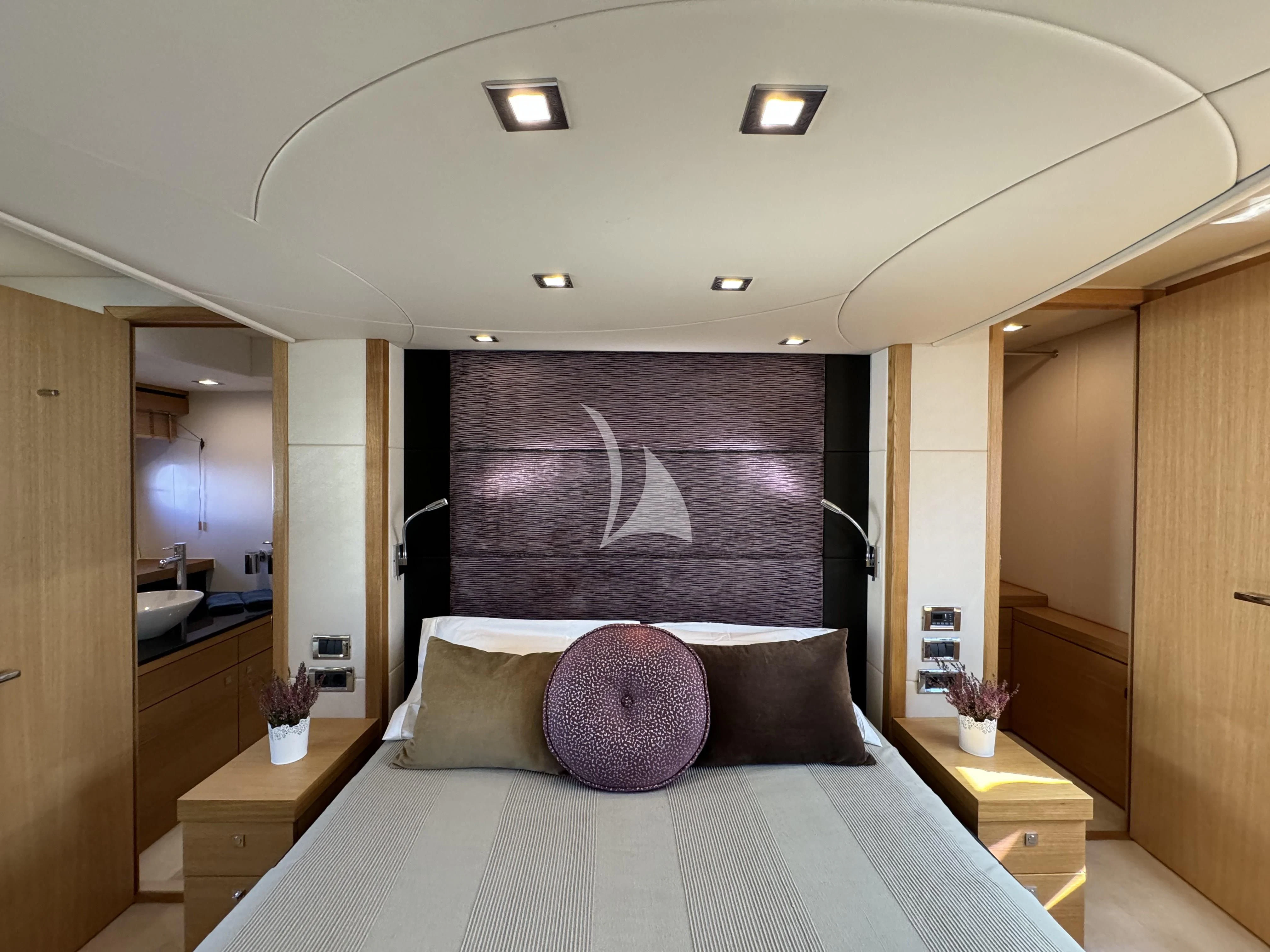 a large bedroom with a large bed aboard POLPO Yacht for Charter
