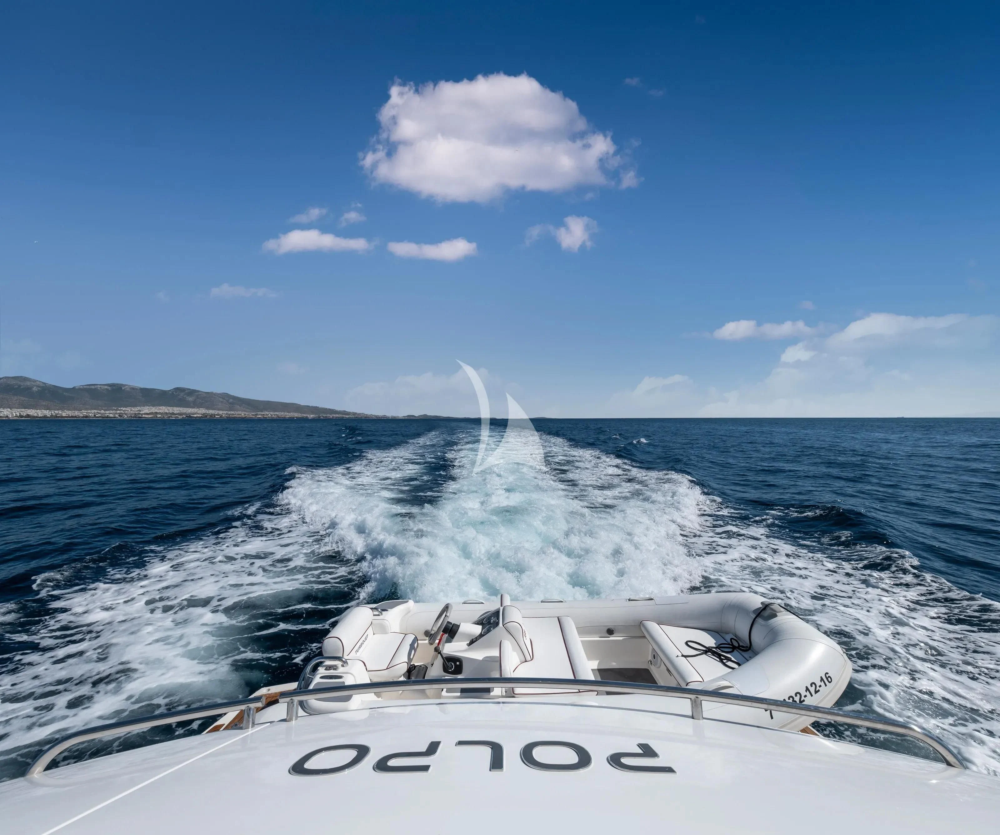 a speedboat on the water aboard POLPO Yacht for Charter