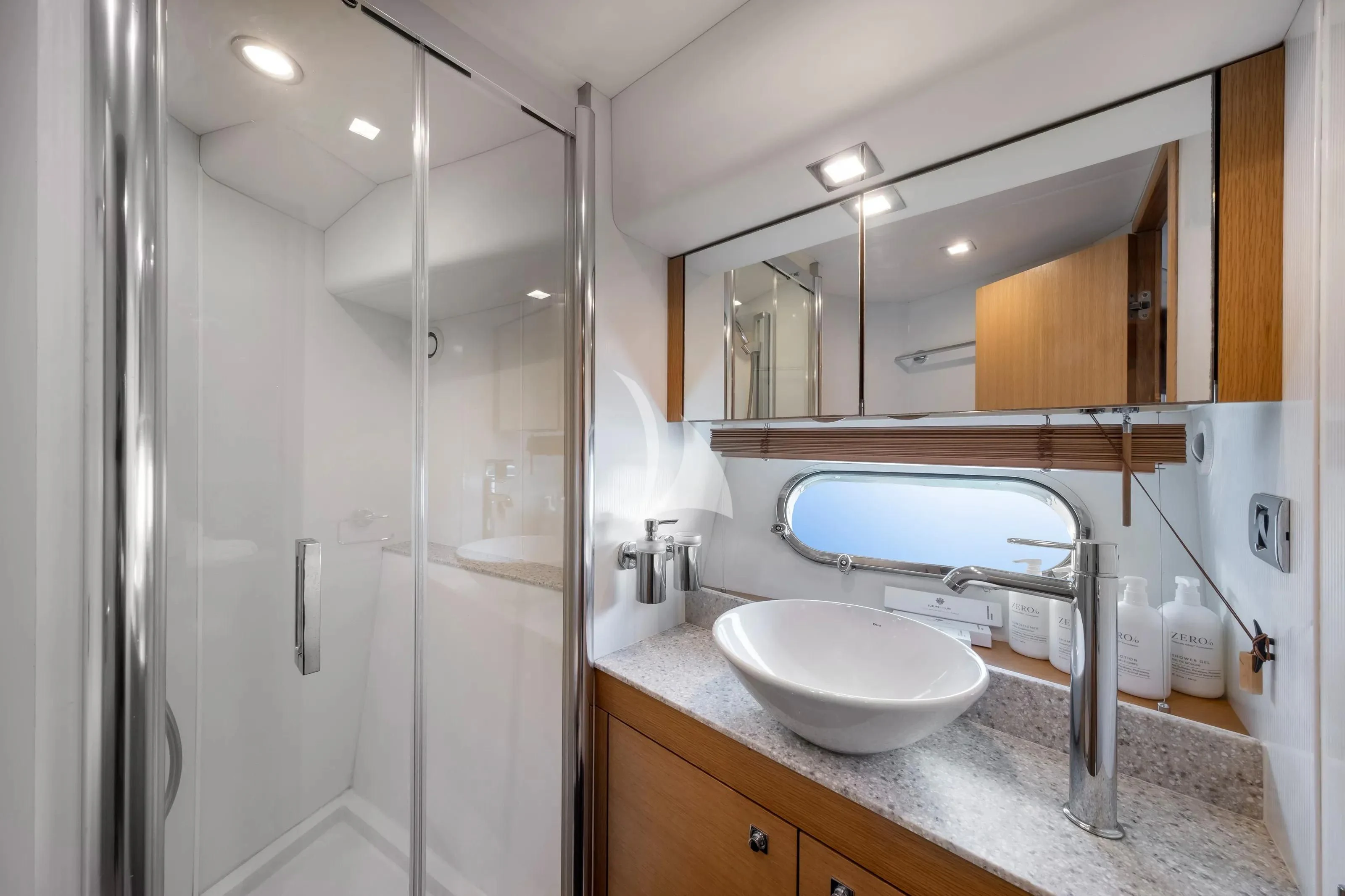 a bathroom with a sink and a shower aboard POLPO Yacht for Charter