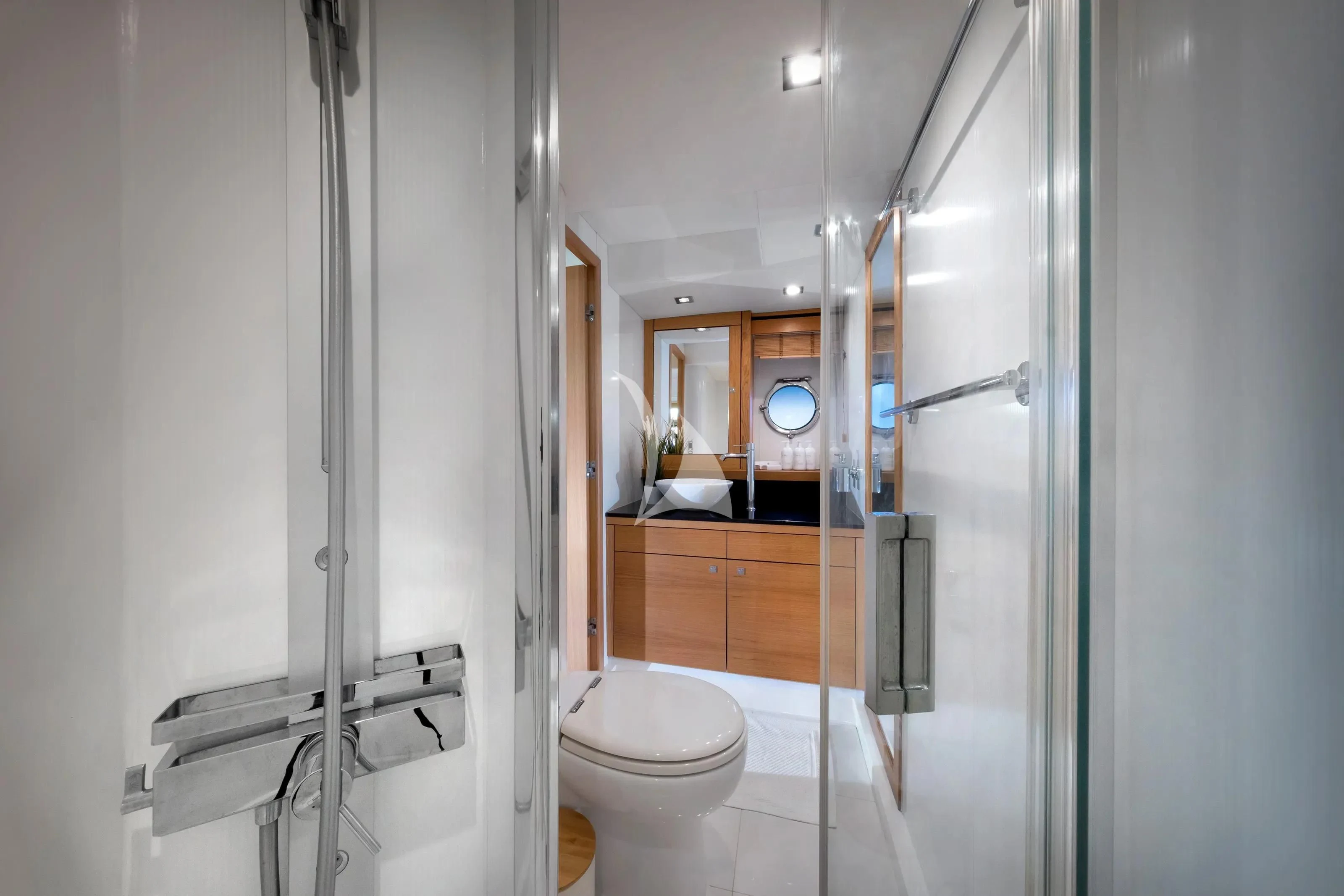 a bathroom with a glass shower aboard POLPO Yacht for Charter