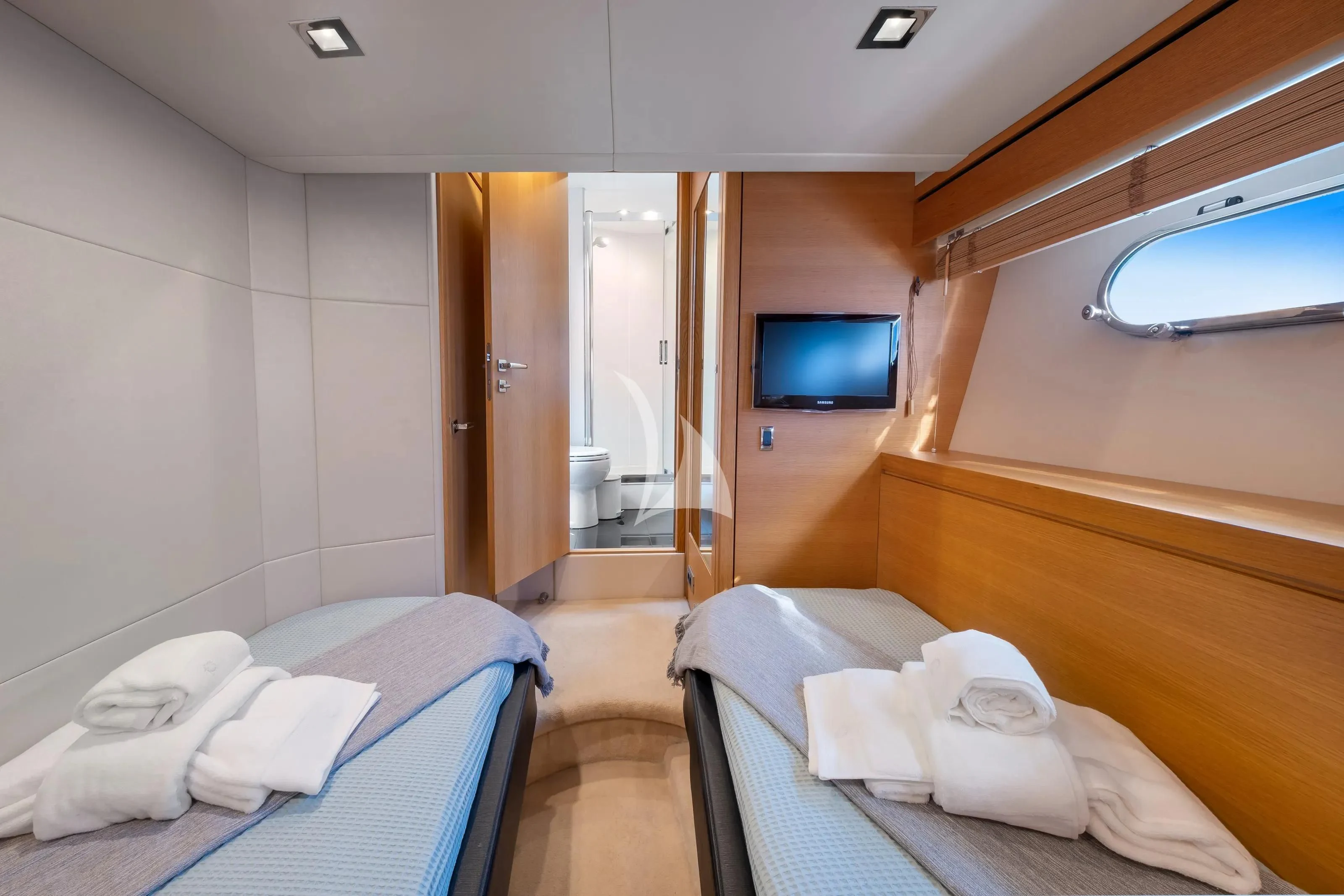 a room with two beds aboard POLPO Yacht for Charter