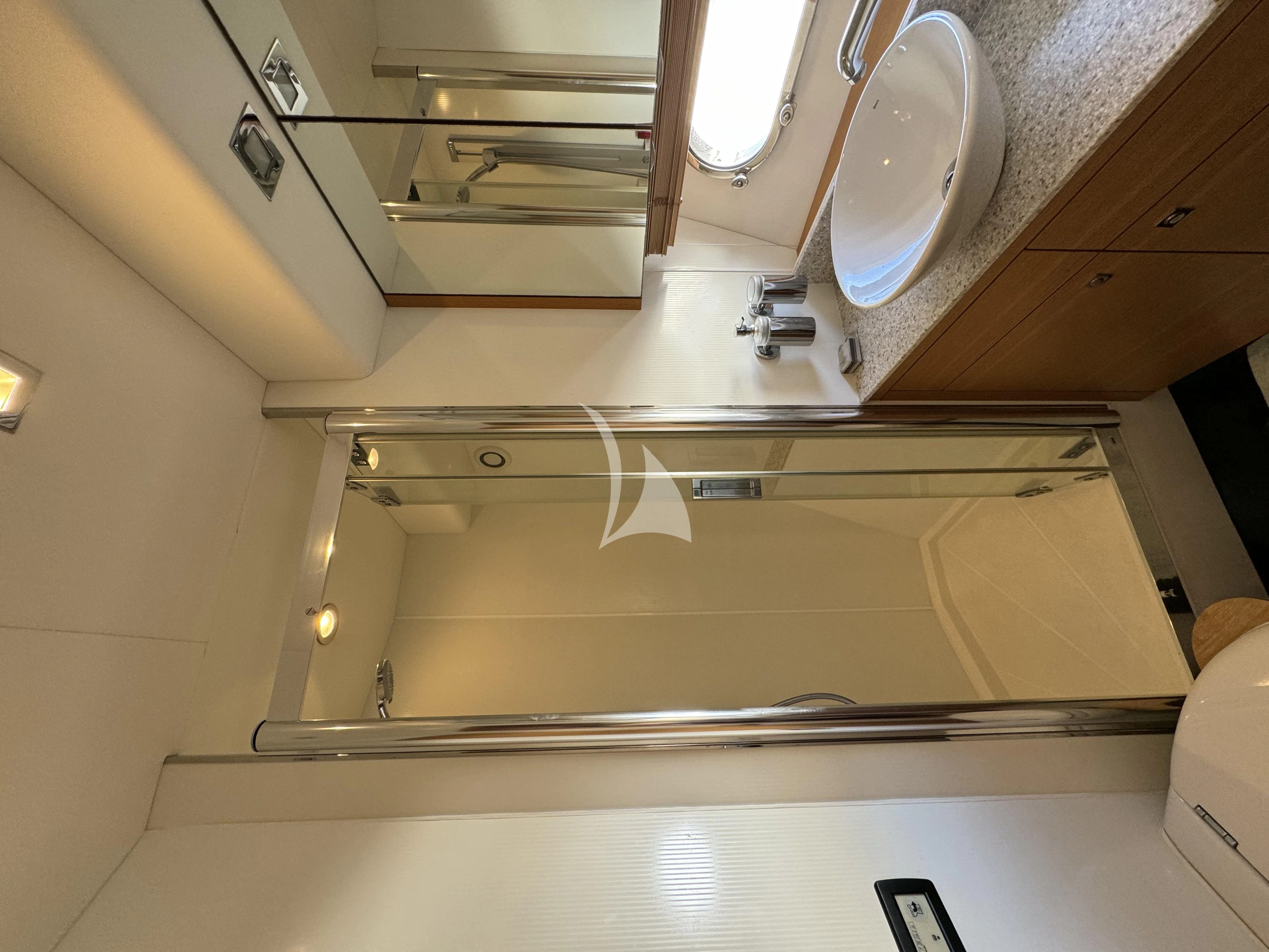 a bathroom with a toilet aboard POLPO Yacht for Charter