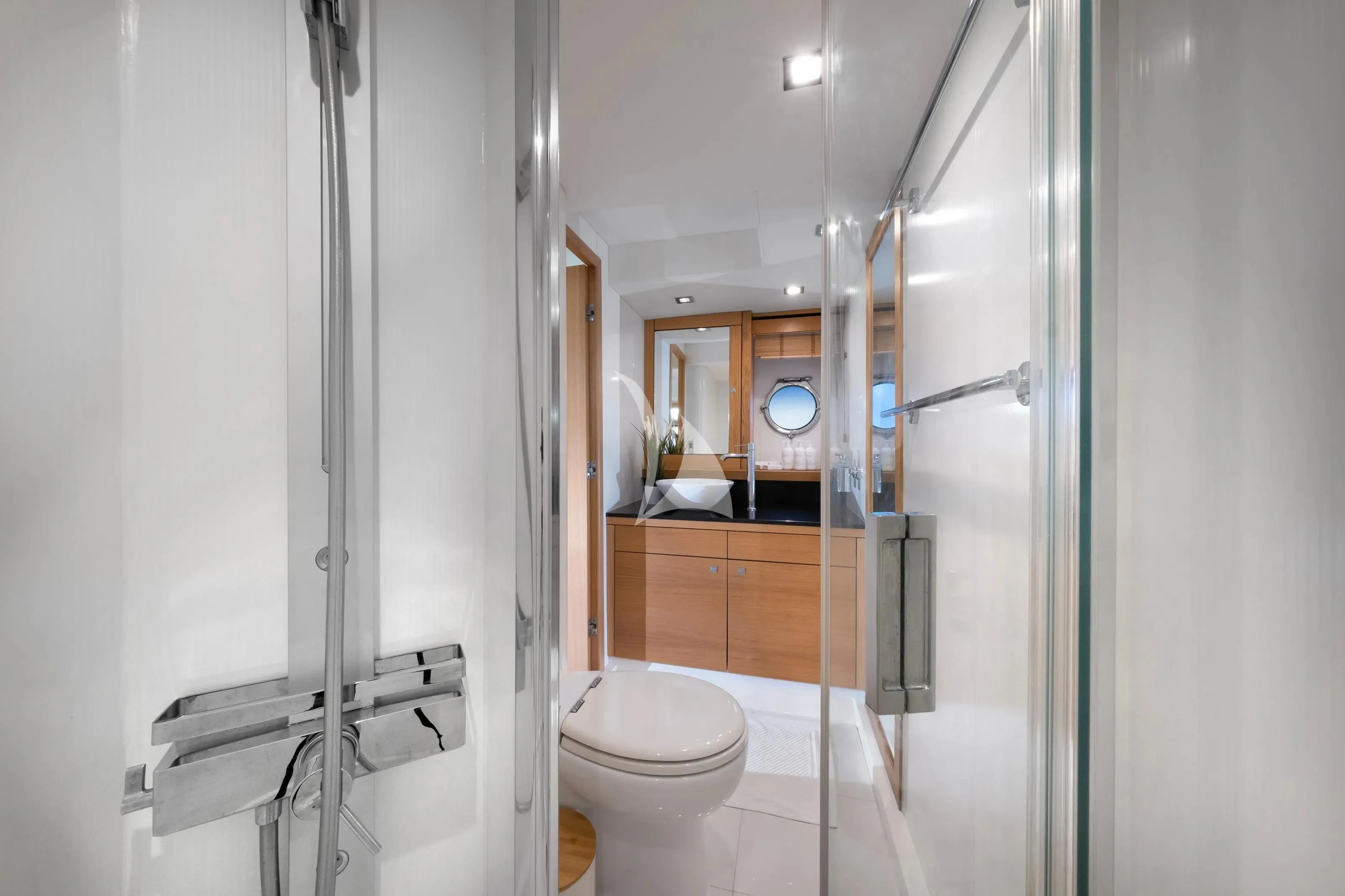 a bathroom with a glass shower aboard POLPO Yacht for Charter