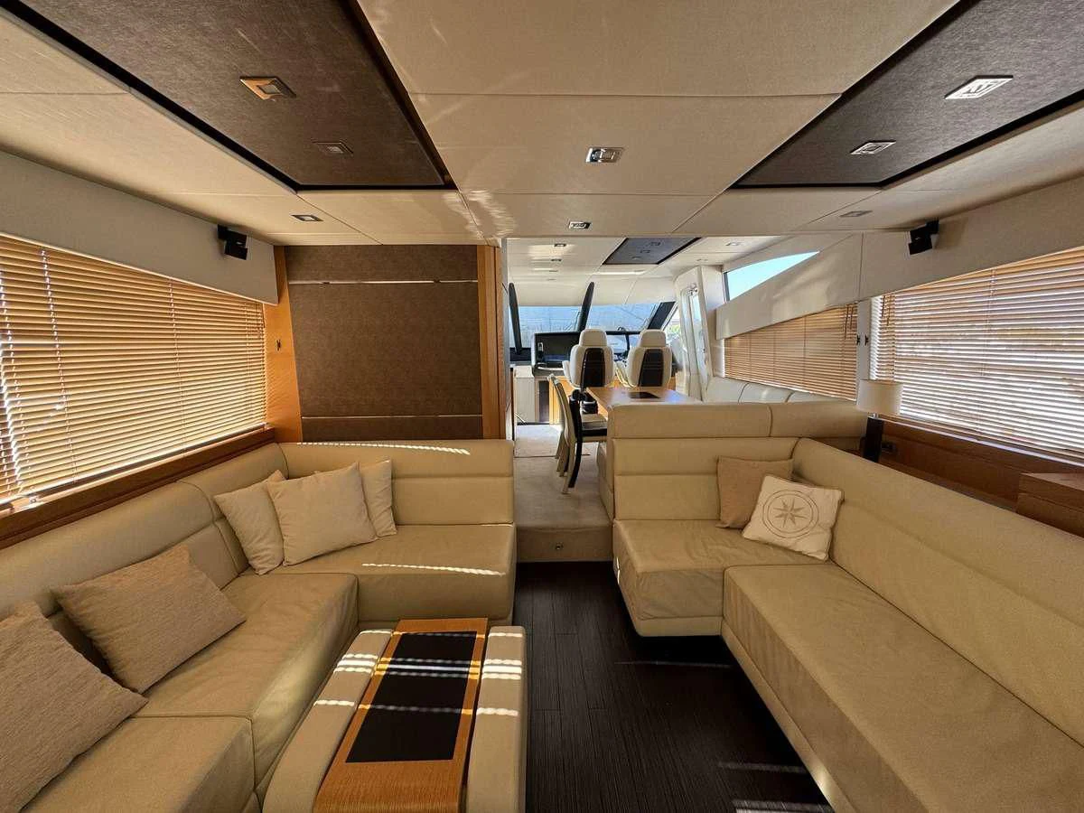 a room with a couch and a table aboard POLPO Yacht for Charter