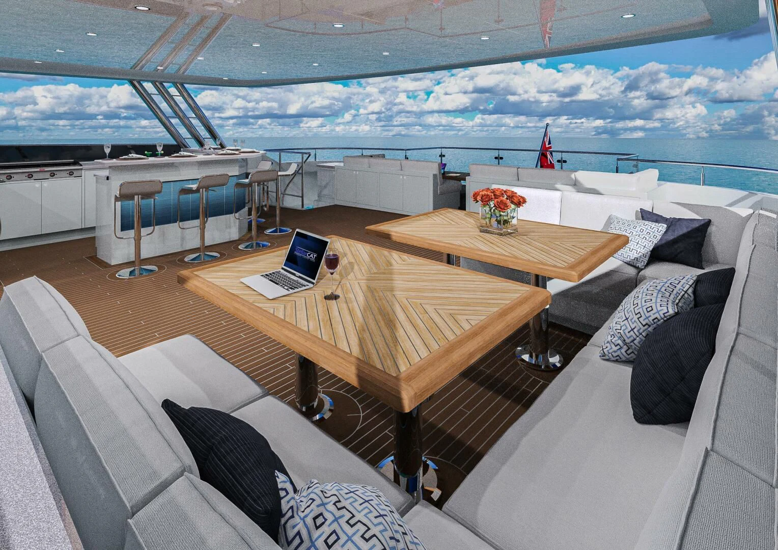 a table with a laptop on it aboard STELLARCAT AL2502 Yacht for Sale