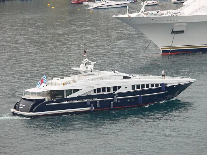 a boat on the water aboard LET IT BE M Yacht for Sale