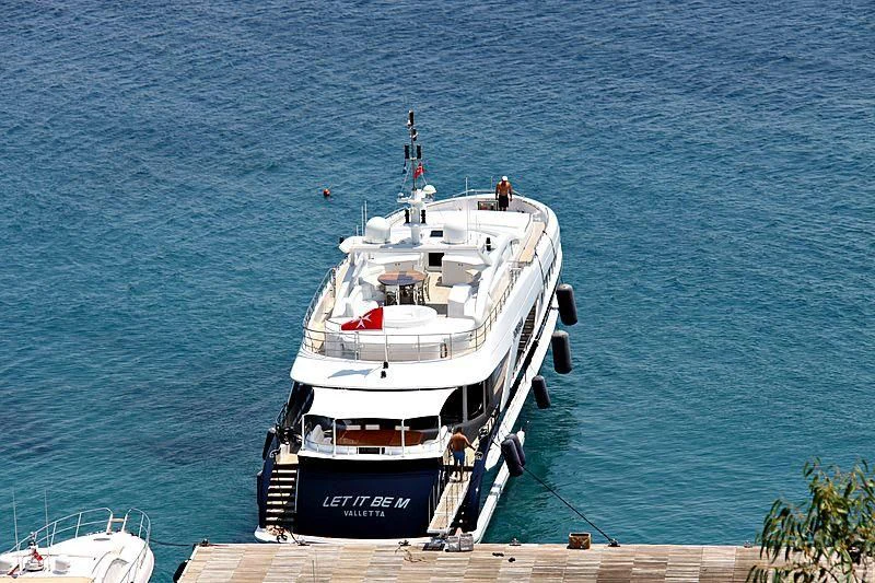 a boat on the water aboard LET IT BE M Yacht for Sale