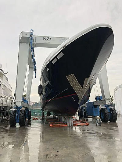 a large white machine with a red stripe on the side aboard LET IT BE M Yacht for Sale
