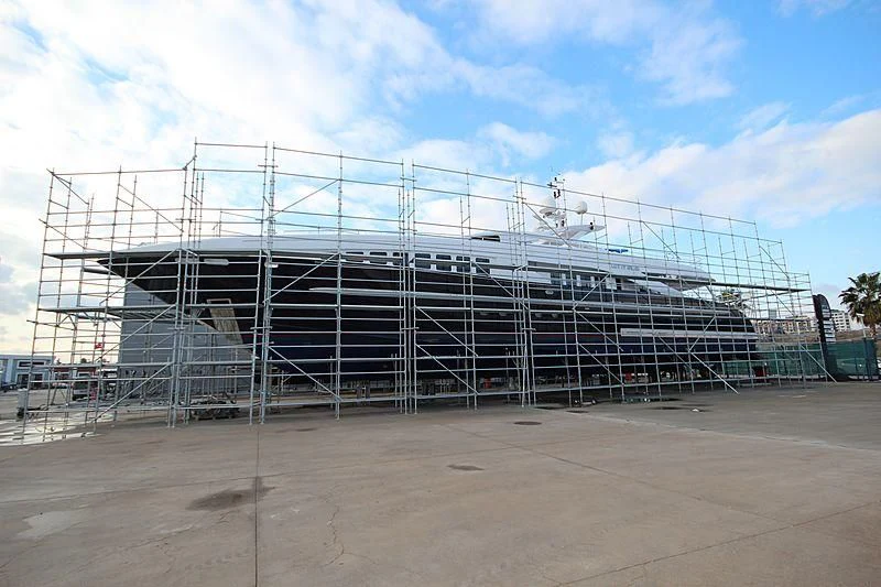a large stadium with a fence around it aboard LET IT BE M Yacht for Sale