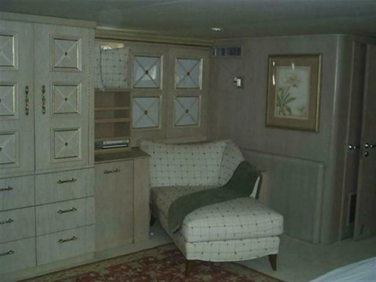 a room with a couch and a chair aboard THE BEST DAY Yacht for Sale