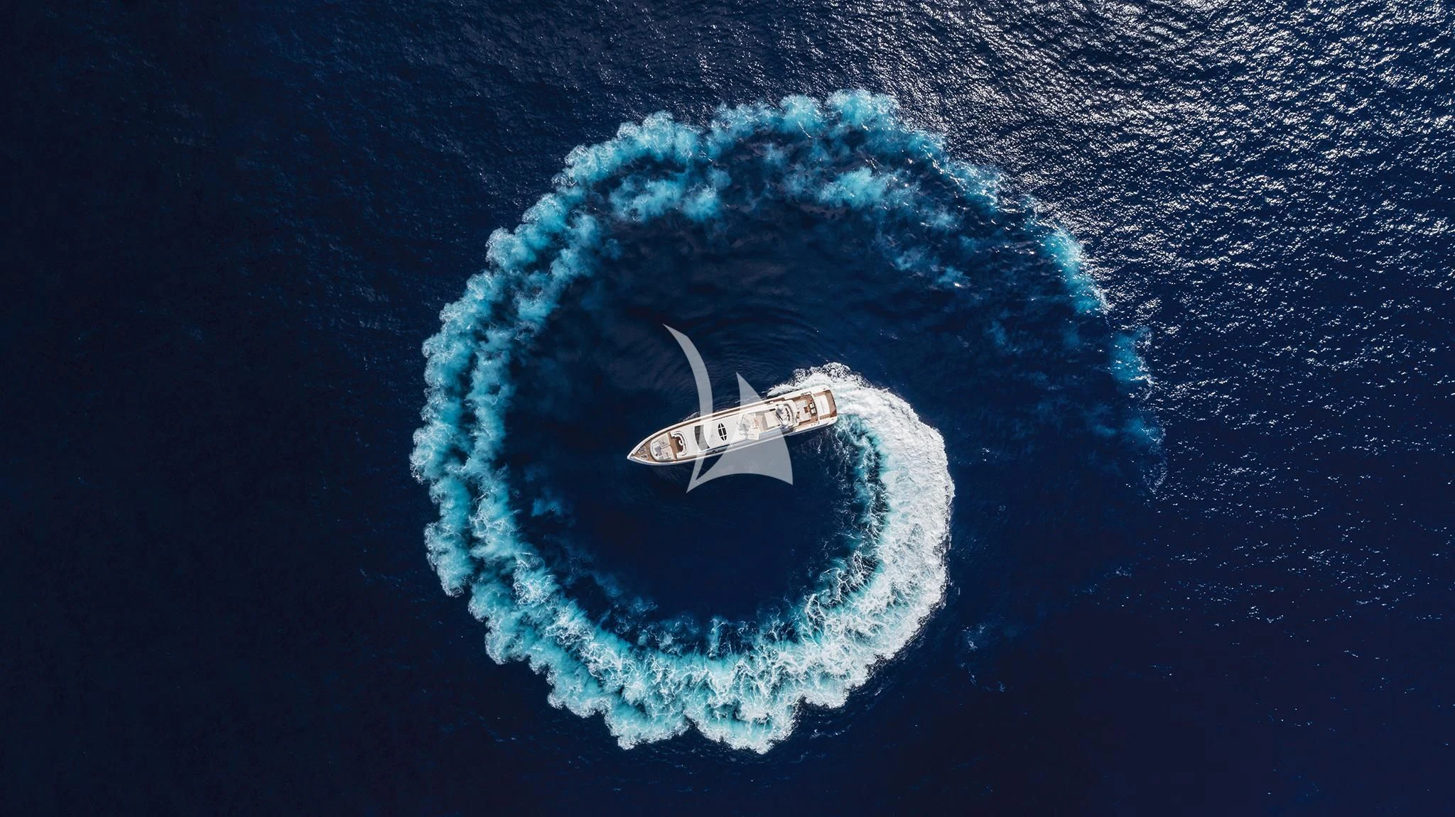 a satellite in space with Great Blue Hole in the background aboard ANTELOPE IV Yacht for Sale