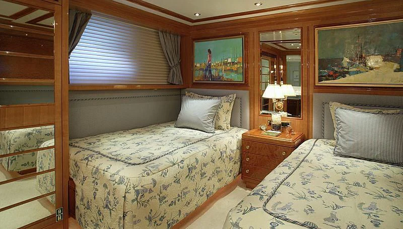 a couple of beds in a room aboard EMELINA Yacht for Sale
